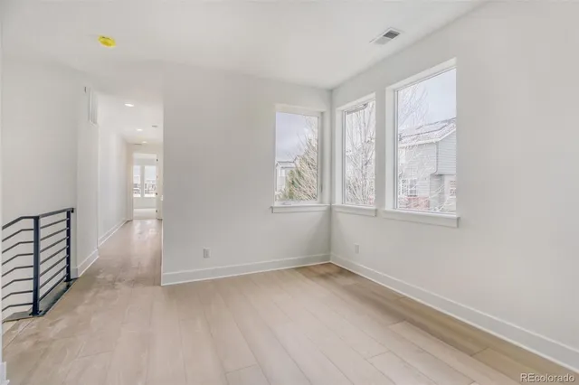 an empty room with windows