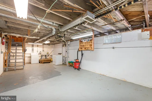 a view of parking garage with cars