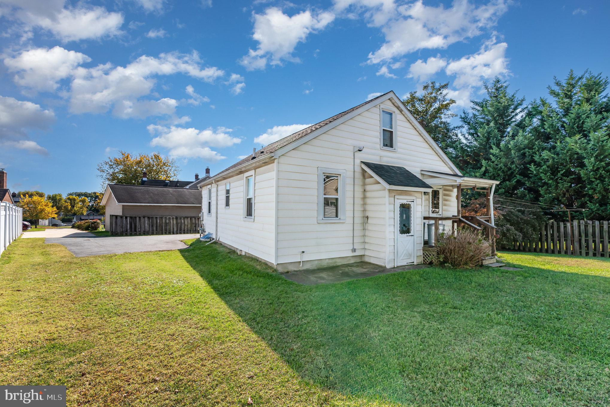 1940 Robinwood Road Baltimore, MD 21222 - Photo 24 of 36 a view of a house with backyard and porch
