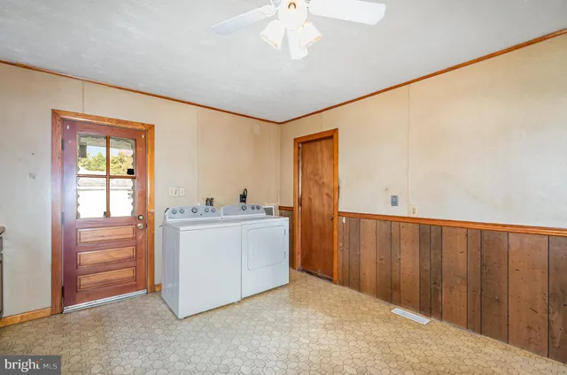 a view of an empty room and window