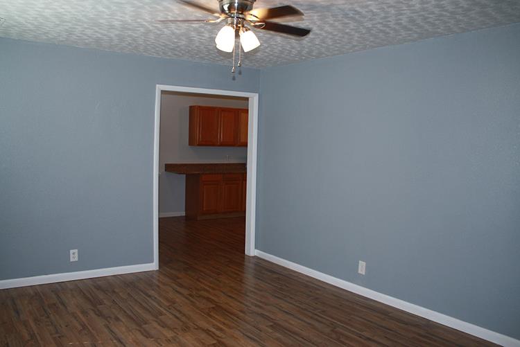267 Raintree Drive Clarksville, TN 37042 - Photo 6 of 10 wooden floor in an empty room with a window