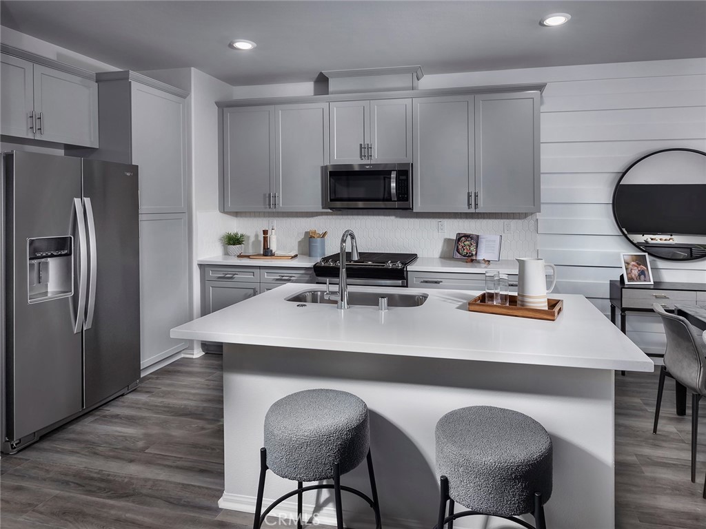 4867 Merida Way Oceanside, CA 92054 - Photo 12 of 19 Photo is not of the actual home, but is an inspirational photo of builder’s model home and may depict options, furnishings, and/or decorator features that are not included