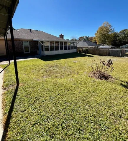 a view of a lake with a building in the background