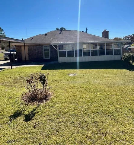 a view of a house with a swimming pool