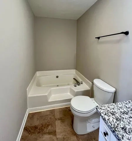 a bathroom with a sink and a toilet