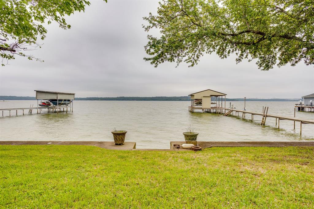 10814 Power Squadron Road Azle, TX 76020 - Photo 3 of 34 a house view with a lake view