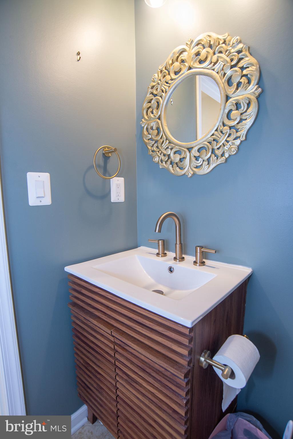 20 Aster Lane Stafford, VA 22554 - Photo 20 of 57 a bathroom with a sink toilet and mirror