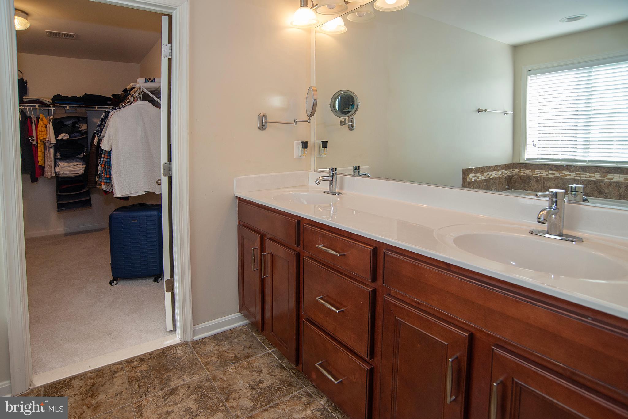 20 Aster Lane Stafford, VA 22554 - Photo 26 of 57 a bathroom with a sink and a mirror