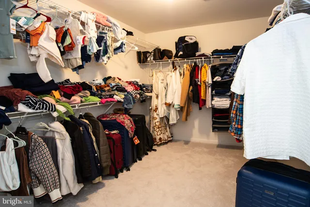 a view of a room with racks on the wall