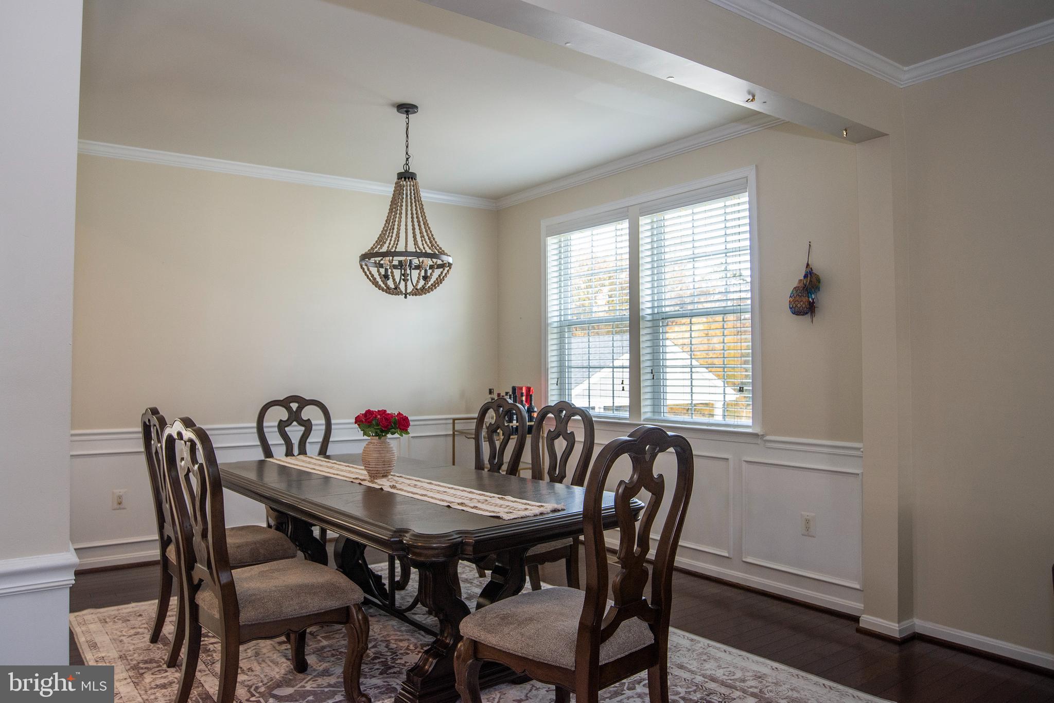 20 Aster Lane Stafford, VA 22554 - Photo 3 of 57 a view of a dining room with furniture window and wooden floor