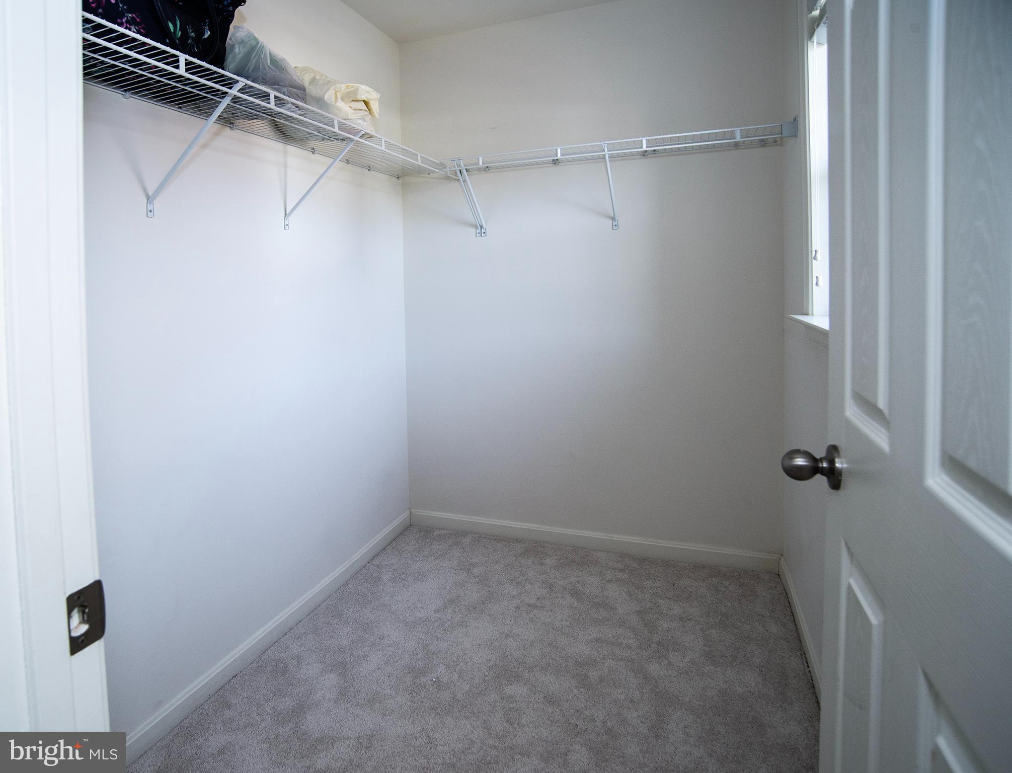 20 Aster Lane Stafford, VA 22554 - Photo 31 of 57 a view of a room with racks on the wall