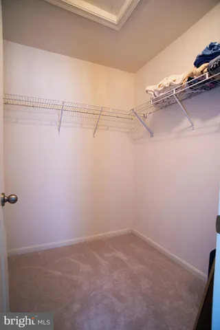 a bathroom with a sink double vanity and a mirror
