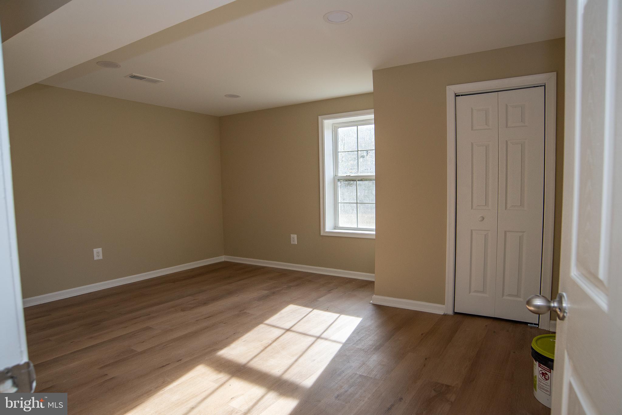 20 Aster Lane Stafford, VA 22554 - Photo 43 of 57 an empty room with wooden floor and windows