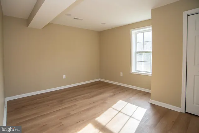 a kitchen with a refrigerator stove and microwave