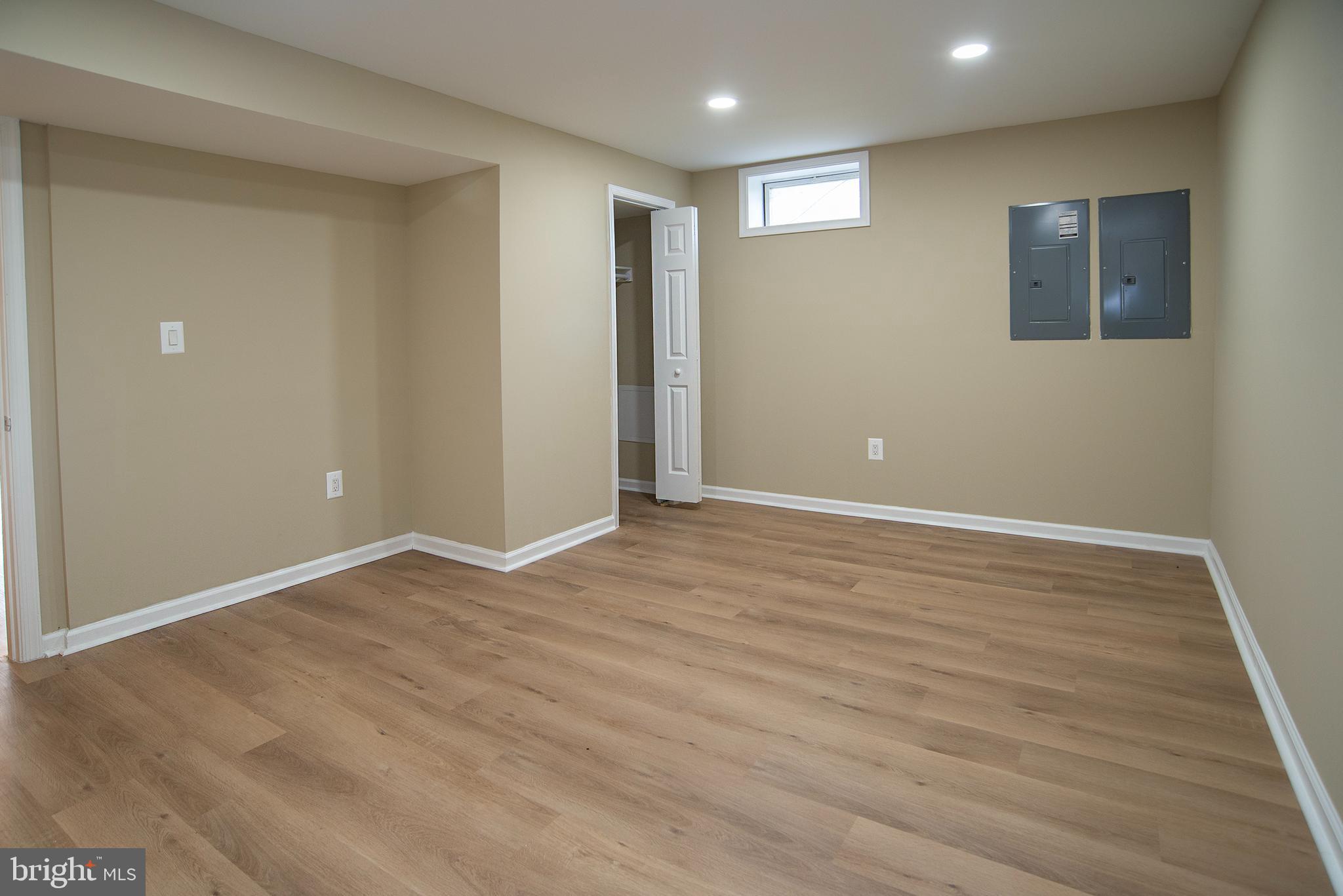 20 Aster Lane Stafford, VA 22554 - Photo 45 of 57 an empty room with wooden floor and windows