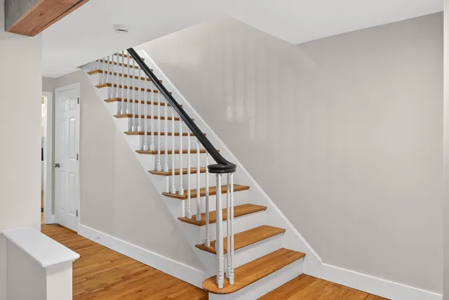 a view of entryway with wooden floor