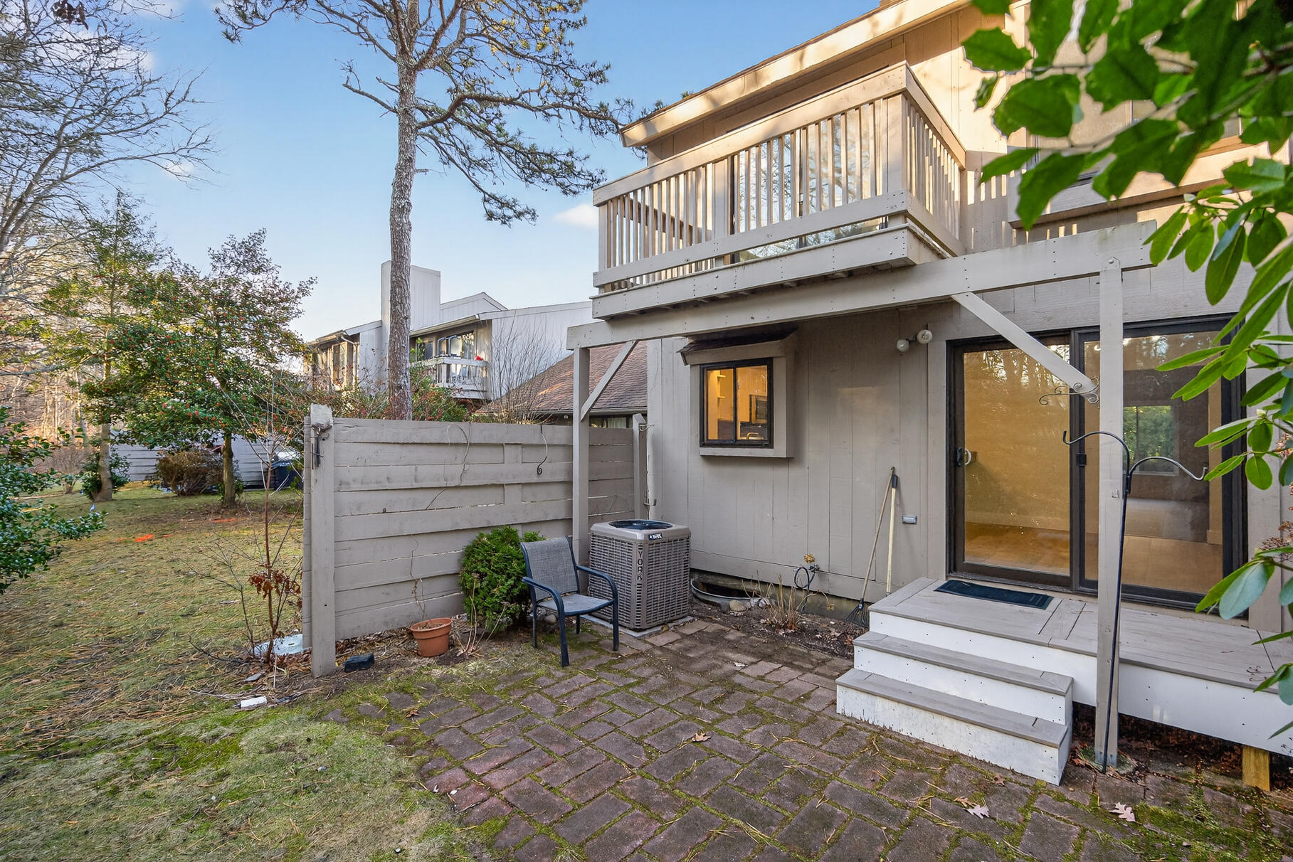 481 Buck Island Road, Unit 11BB West Yarmouth, MA 02673 - Photo 31 of 34 a front view of a house with a garden