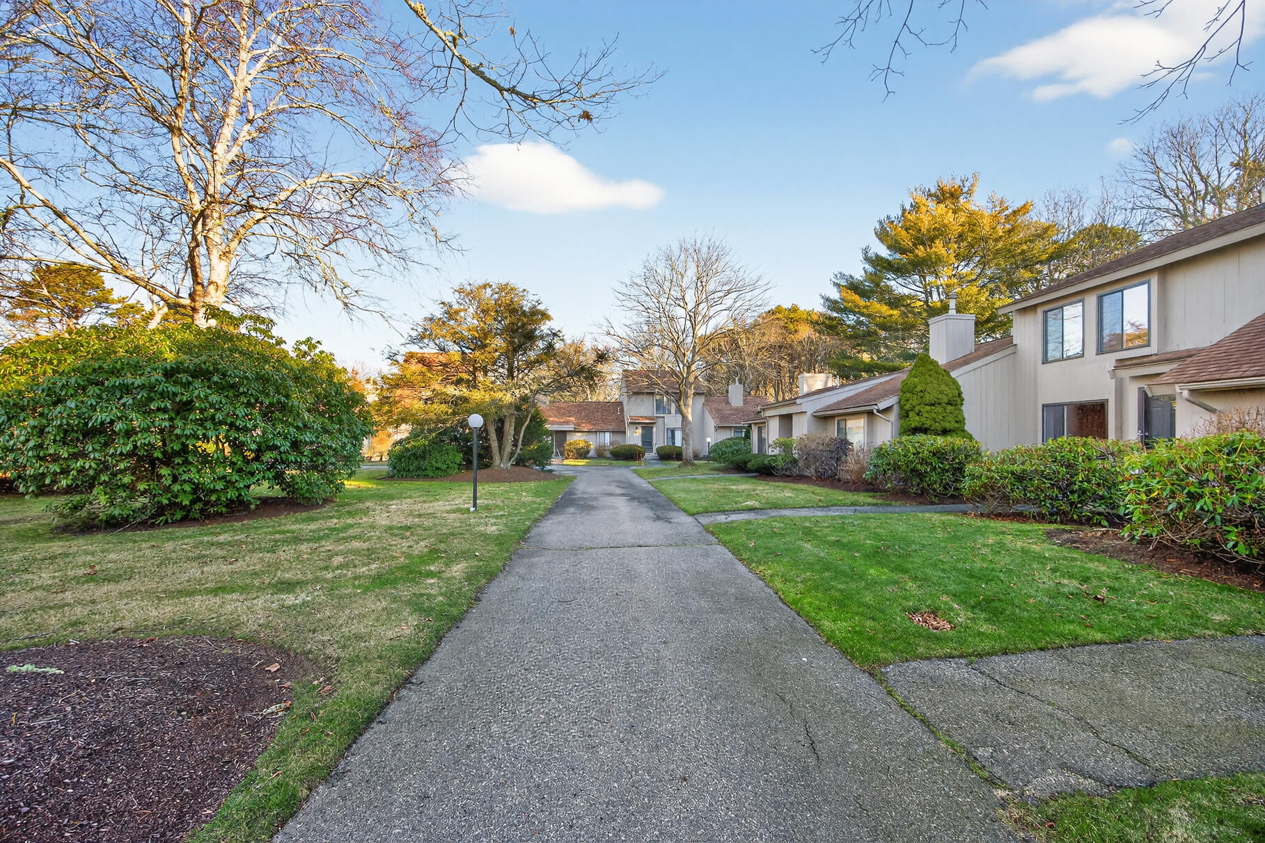 481 Buck Island Road, Unit 11BB West Yarmouth, MA 02673 - Photo 33 of 34 a view of a street with a building in the background
