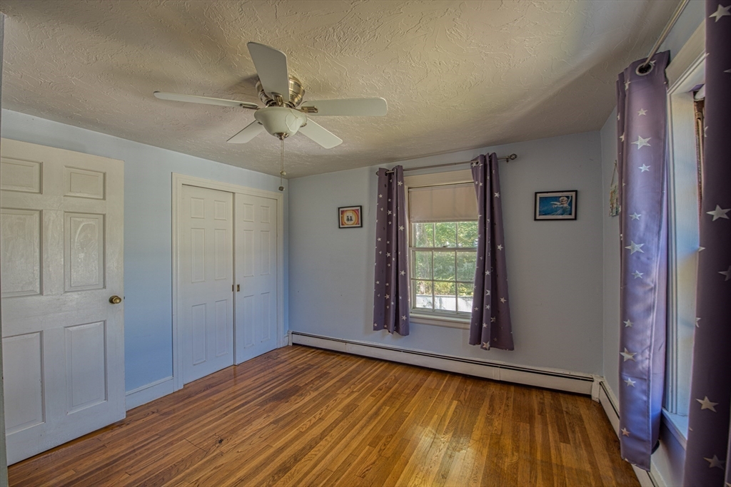 137 Pond Street Sharon, MA 02067 - Photo 16 of 23 wooden floor in an empty room with a window