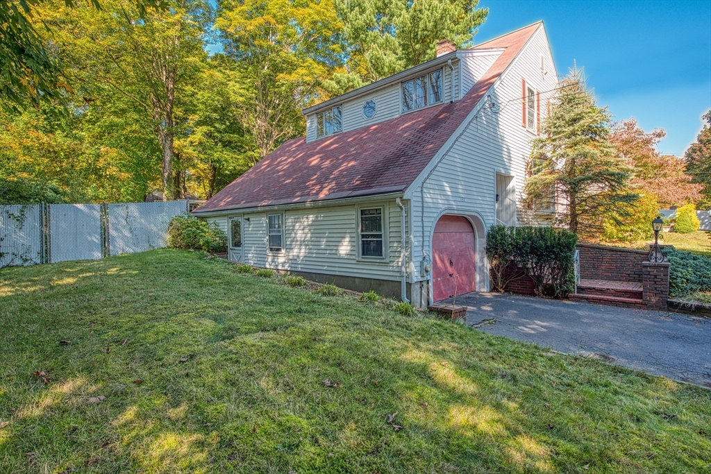 137 Pond Street Sharon, MA 02067 - Photo 2 of 23 a view of a house with a yard and sitting area