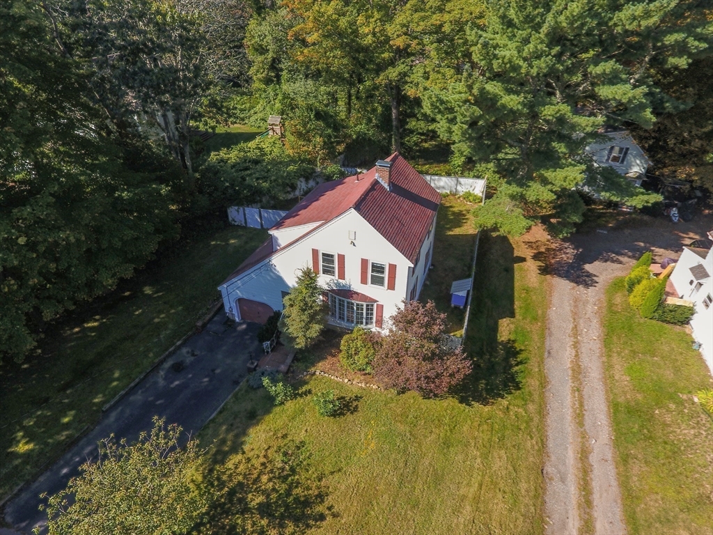 137 Pond Street Sharon, MA 02067 - Photo 23 of 23 a house view with a garden space