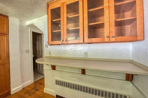 a bathroom with a sink and a window
