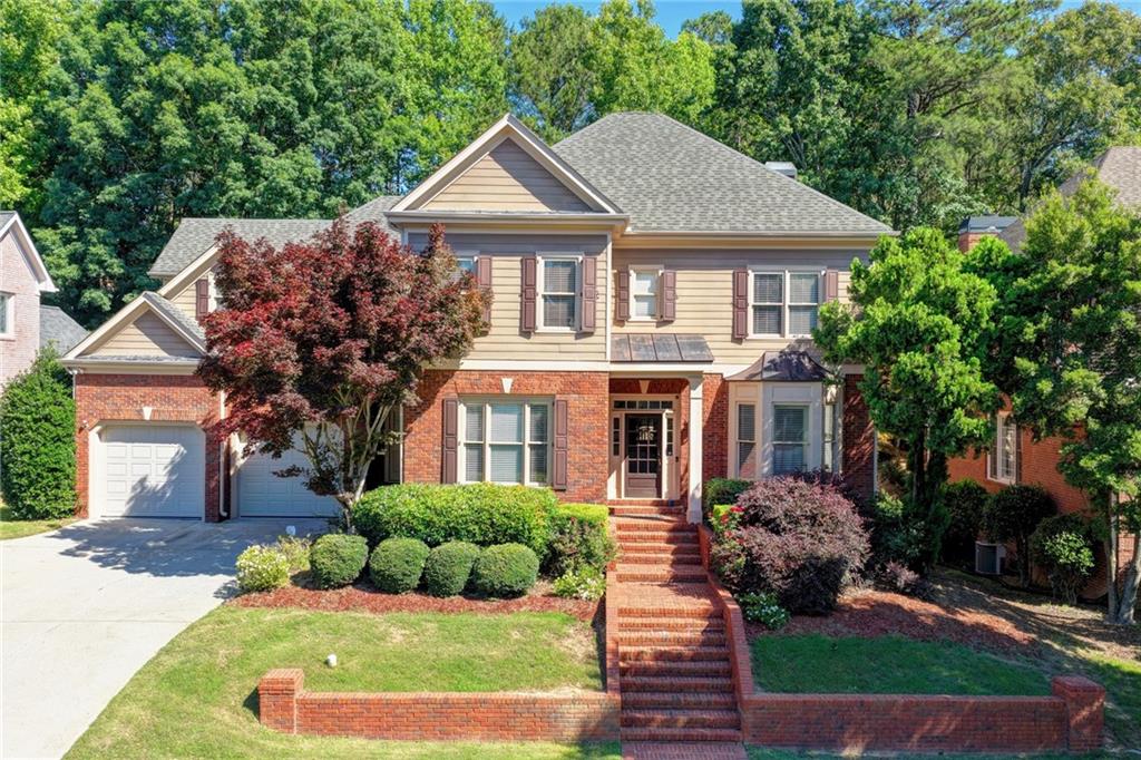 991 Moores Walk Lane Suwanee, GA 30024 - Photo 1 of 90
