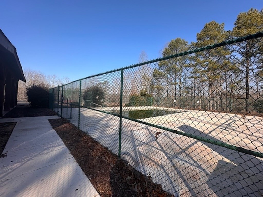 1665 Hunter Drive Ranger, GA 30734 - Photo 11 of 18 a view of a pathway with a wrought fence