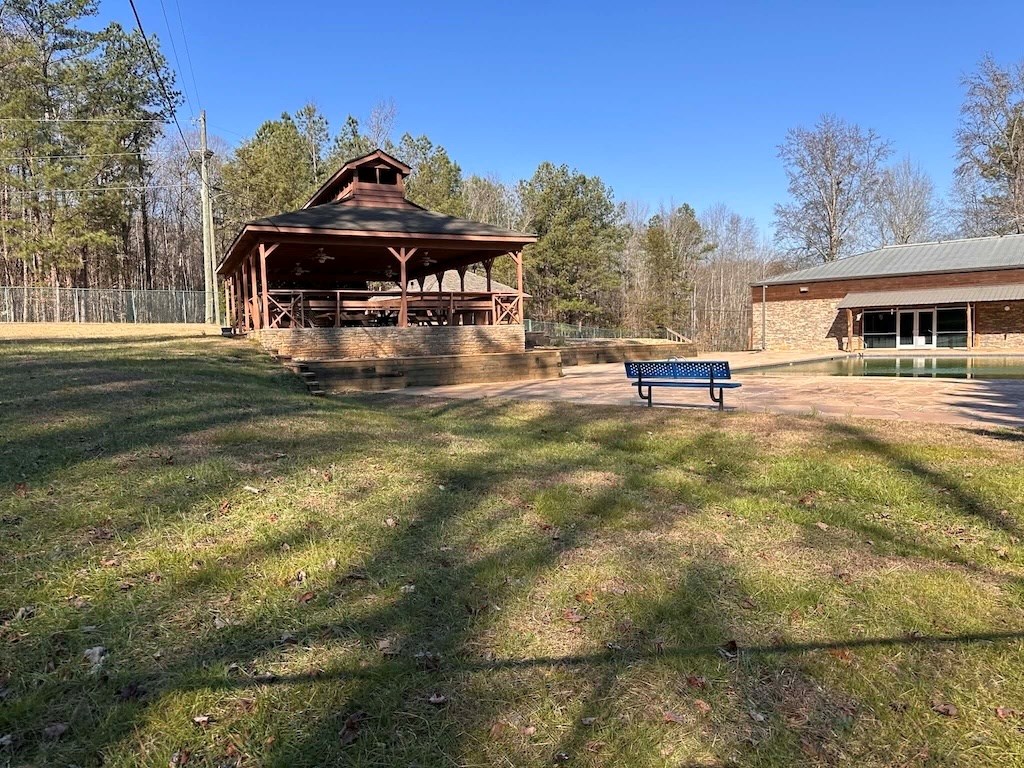 1665 Hunter Drive Ranger, GA 30734 - Photo 18 of 18 a view of a house with a yard