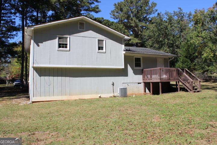 163 Terri Road LaGrange, GA 30240 - Photo 12 of 13 a front view of house with yard and trees in the background