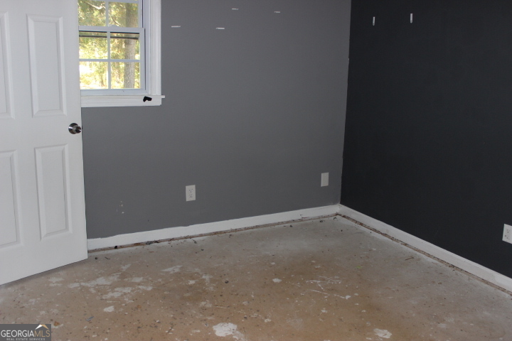 163 Terri Road LaGrange, GA 30240 - Photo 6 of 13 an empty room with windows