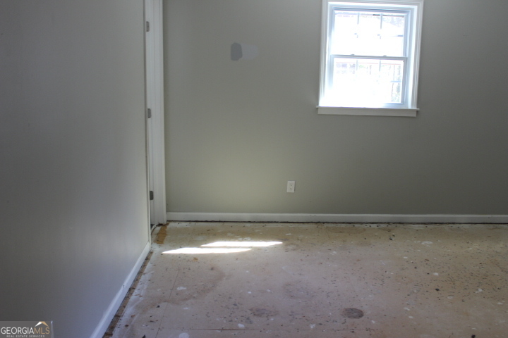 163 Terri Road LaGrange, GA 30240 - Photo 8 of 13 an empty room with a window
