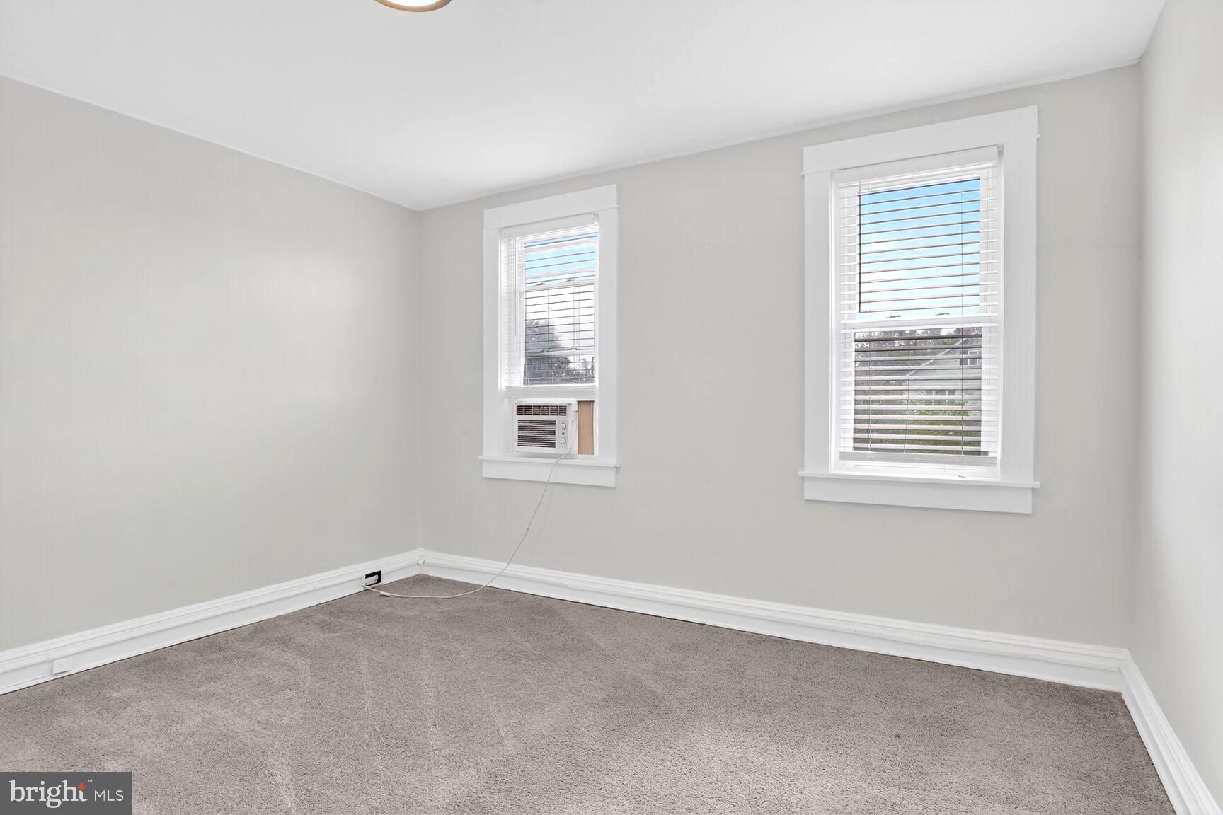 3808 6th Street Baltimore, MD 21225 - Photo 12 of 21 an empty room with a window