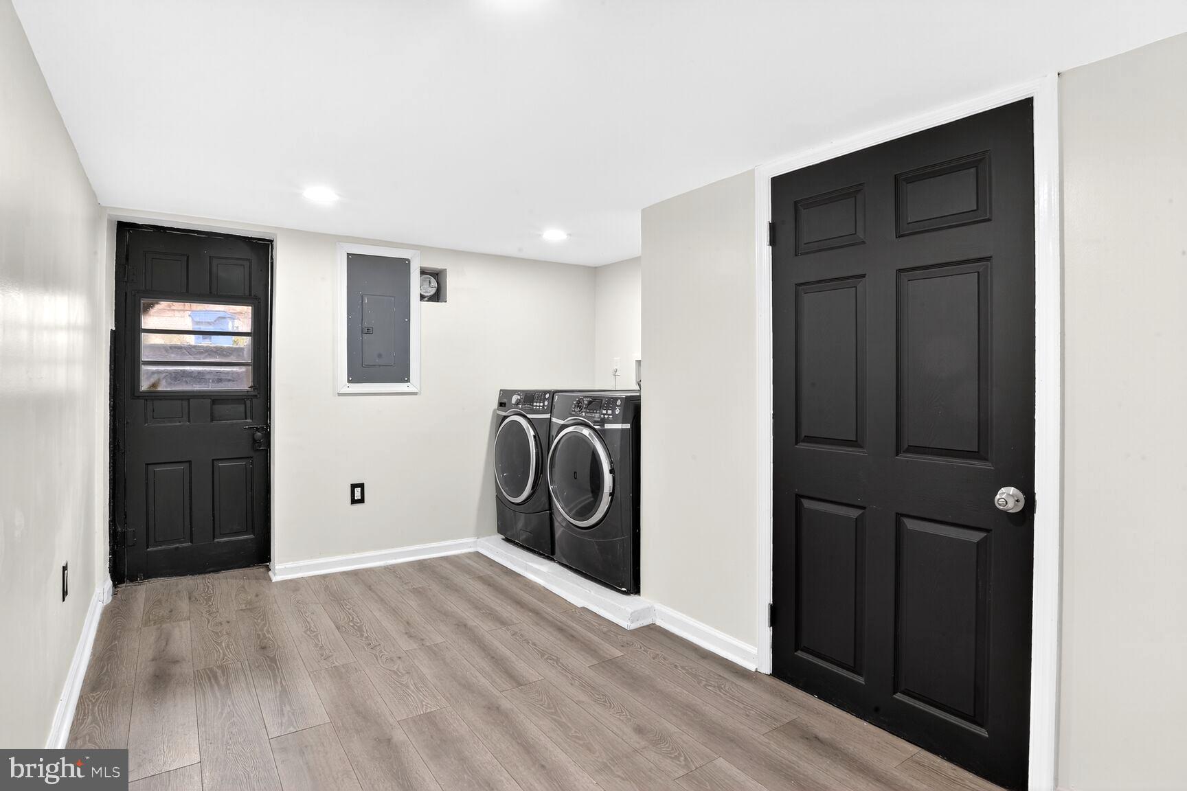 3808 6th Street Baltimore, MD 21225 - Photo 16 of 21 a view of a storage & utility room with refrigerator and washer
