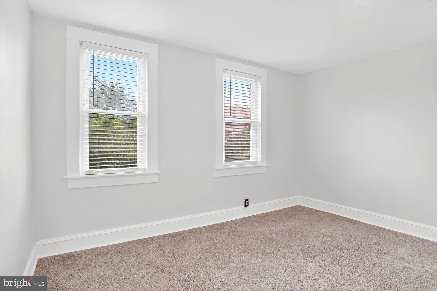3808 6th Street Baltimore, MD 21225 - Photo 7 of 21 an empty room with a window