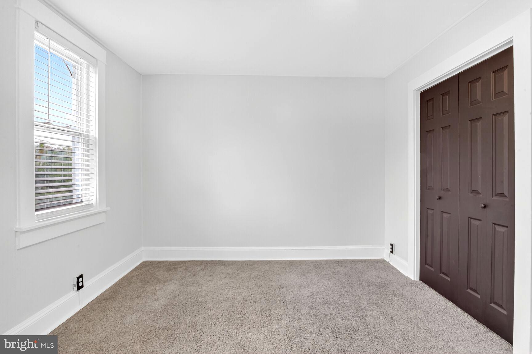 3808 6th Street Baltimore, MD 21225 - Photo 8 of 21 an empty room with a window