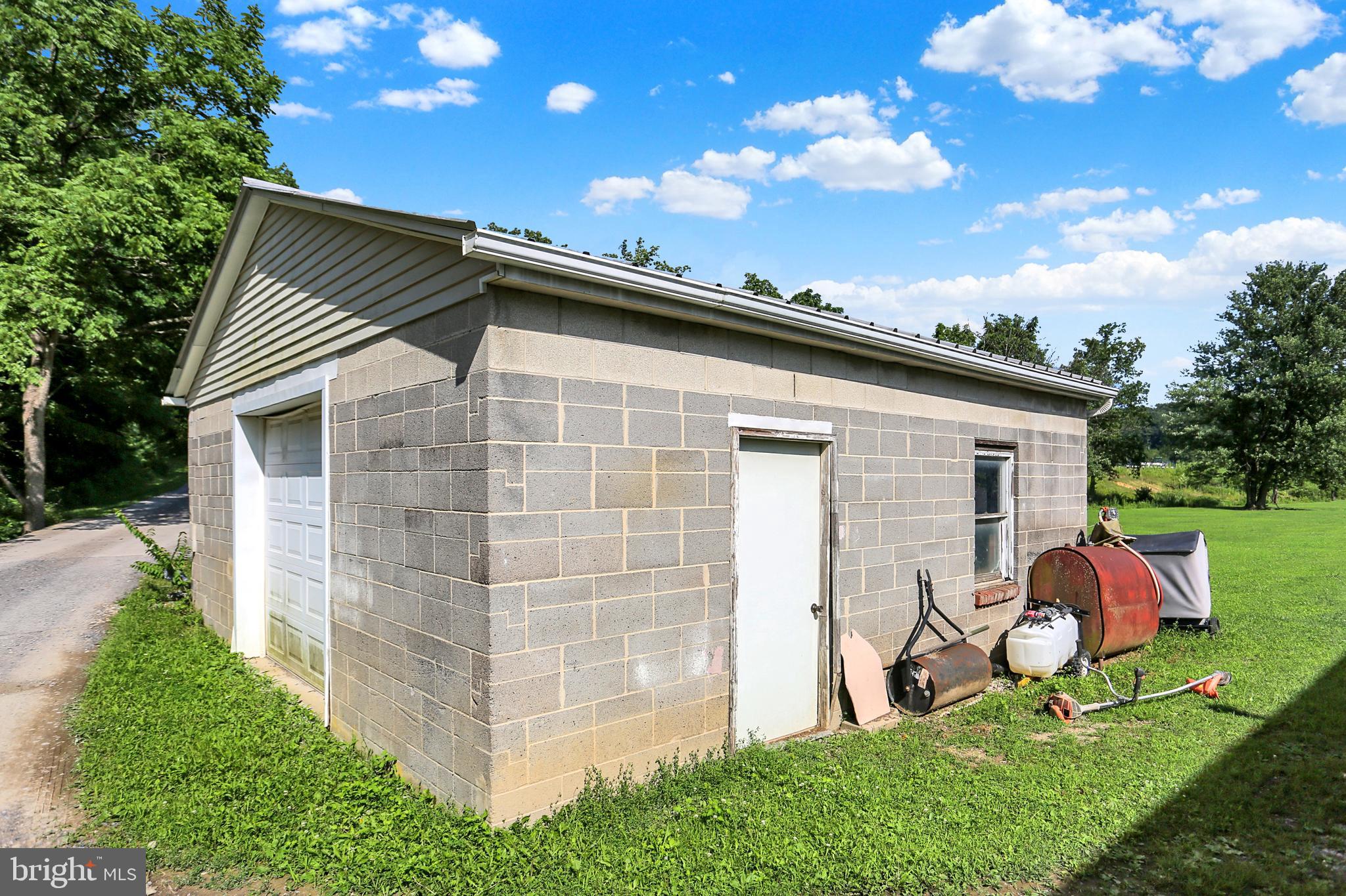 8370 Rte 104 Mount Pleasant Mills, PA 17853 - Photo 15 of 71 a backyard of a house with table and chairs