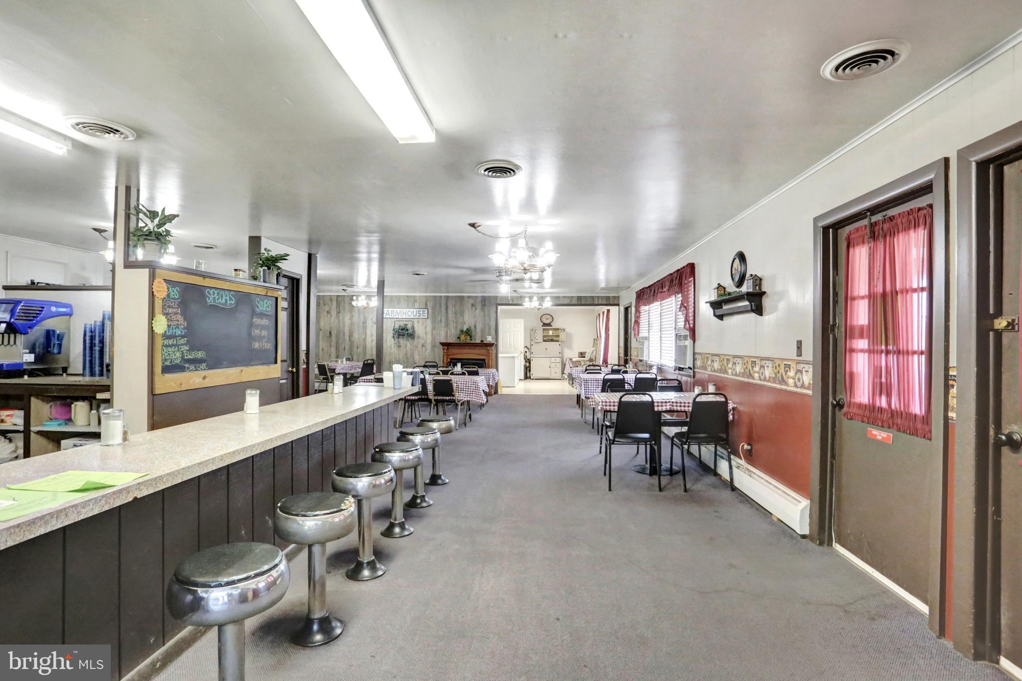 8370 Rte 104 Mount Pleasant Mills, PA 17853 - Photo 16 of 71 a large living room with stainless steel appliances furniture a couch and a view of living room