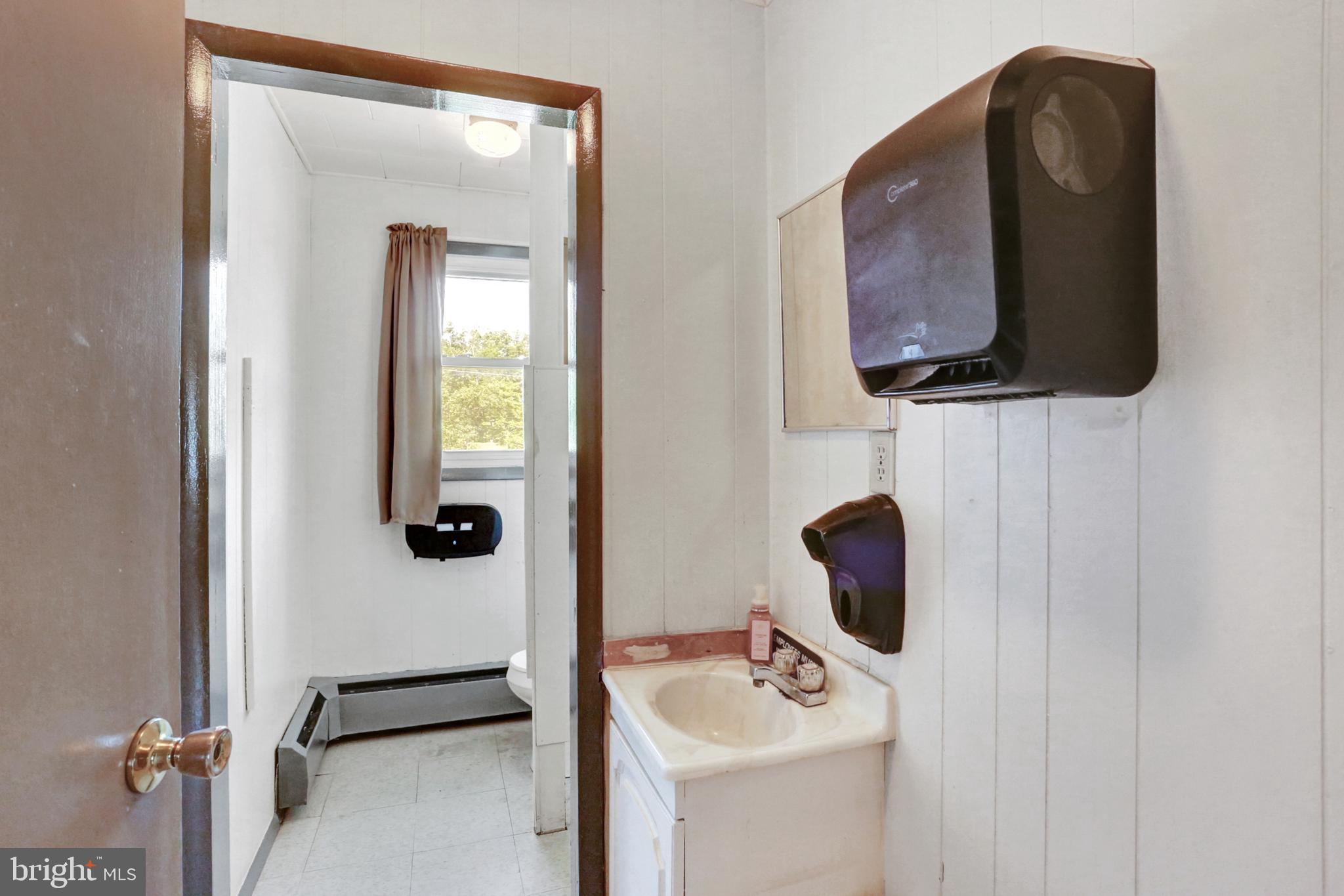8370 Rte 104 Mount Pleasant Mills, PA 17853 - Photo 23 of 71 a bathroom with a sink and a mirror