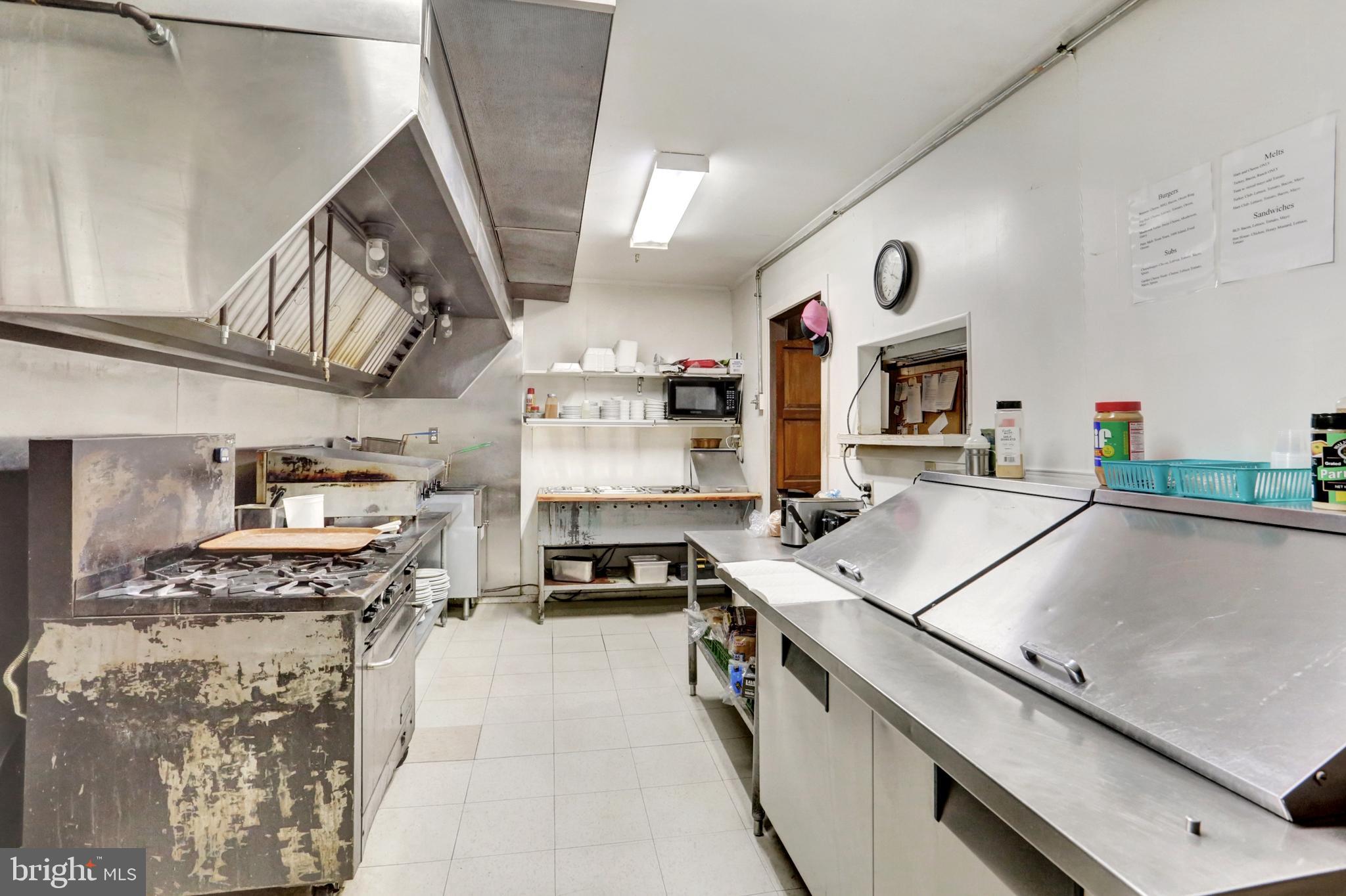 8370 Rte 104 Mount Pleasant Mills, PA 17853 - Photo 26 of 71 a kitchen with stainless steel appliances granite countertop a sink a stove and a refrigerator