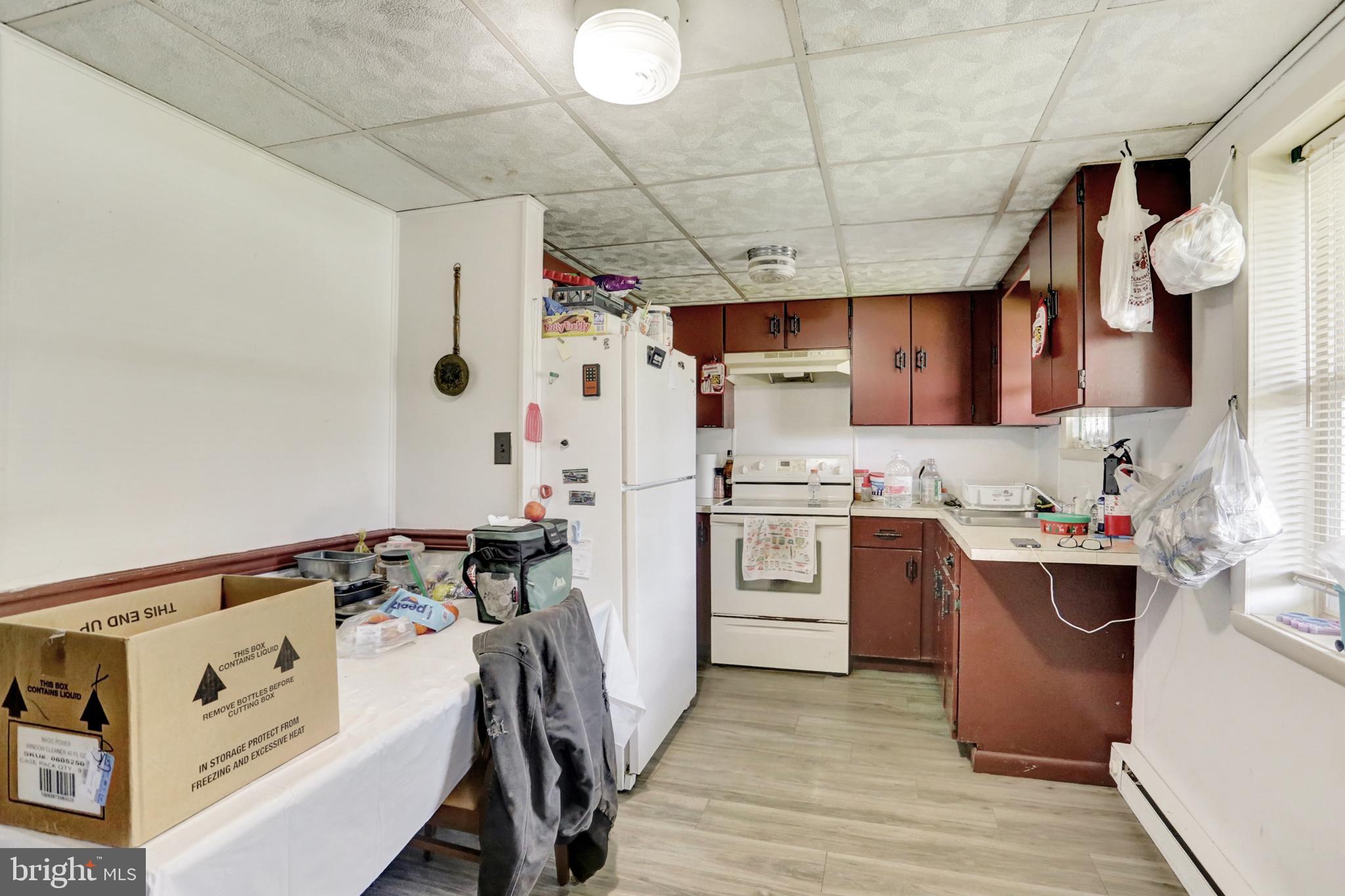 8370 Rte 104 Mount Pleasant Mills, PA 17853 - Photo 55 of 71 a kitchen with cabinets a sink and appliances