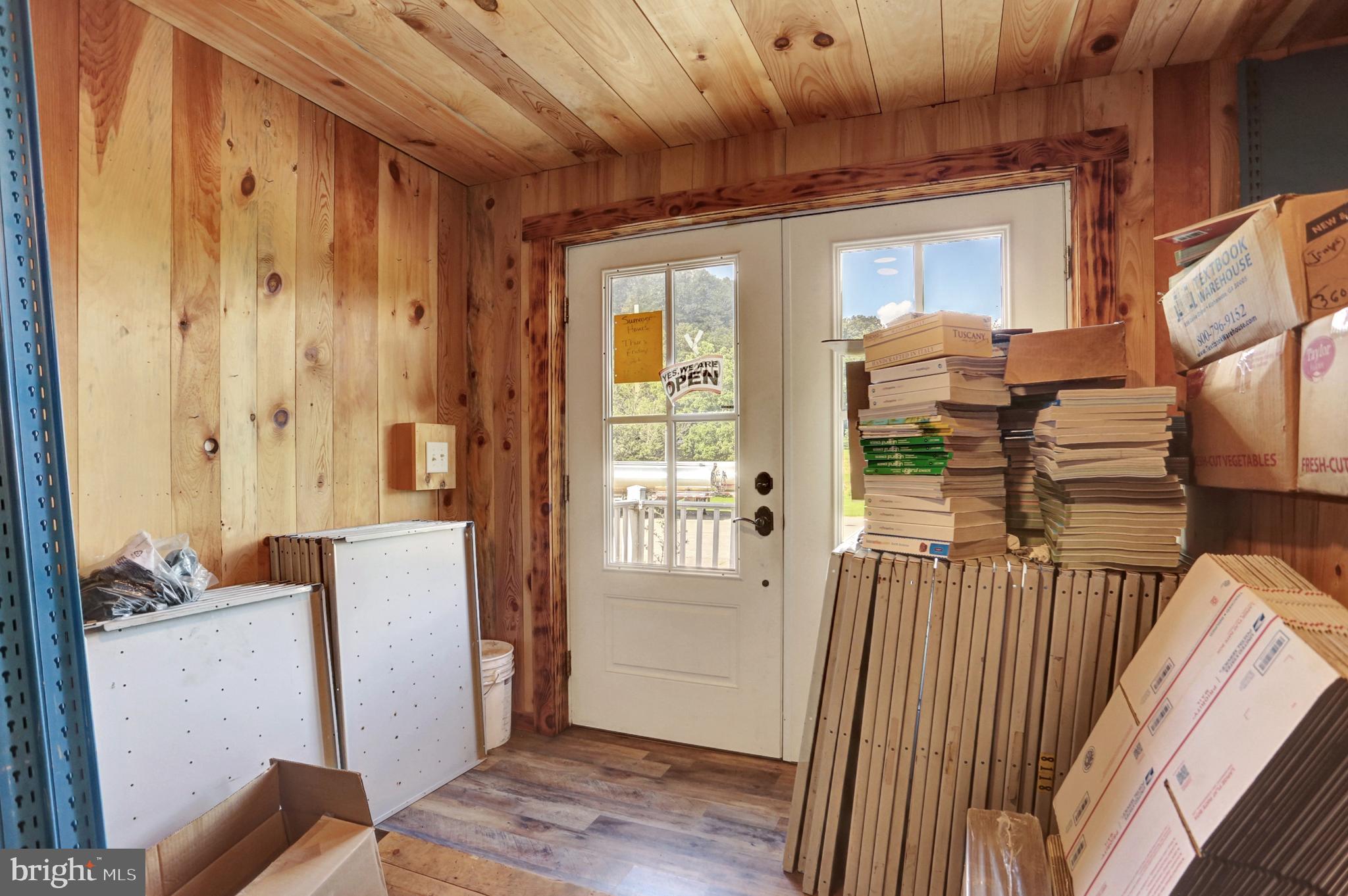 8370 Rte 104 Mount Pleasant Mills, PA 17853 - Photo 61 of 71 a view of a hallway with wooden floor and a livingroom