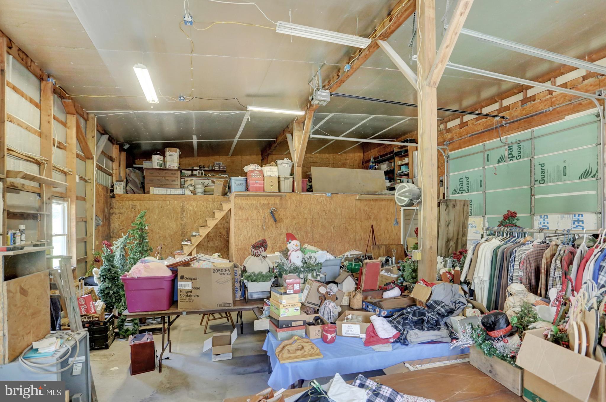 8370 Rte 104 Mount Pleasant Mills, PA 17853 - Photo 66 of 71 a view of a storage room with racks on the wall