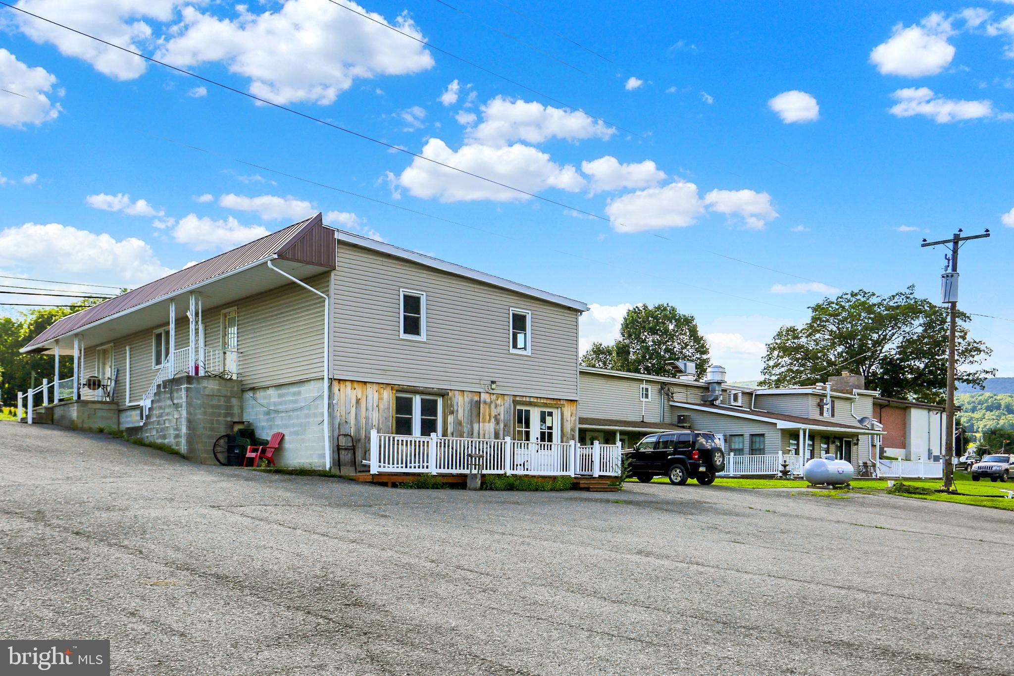 8370 Rte 104 Mount Pleasant Mills, PA 17853 - Photo 7 of 71 a car parked in front of a house