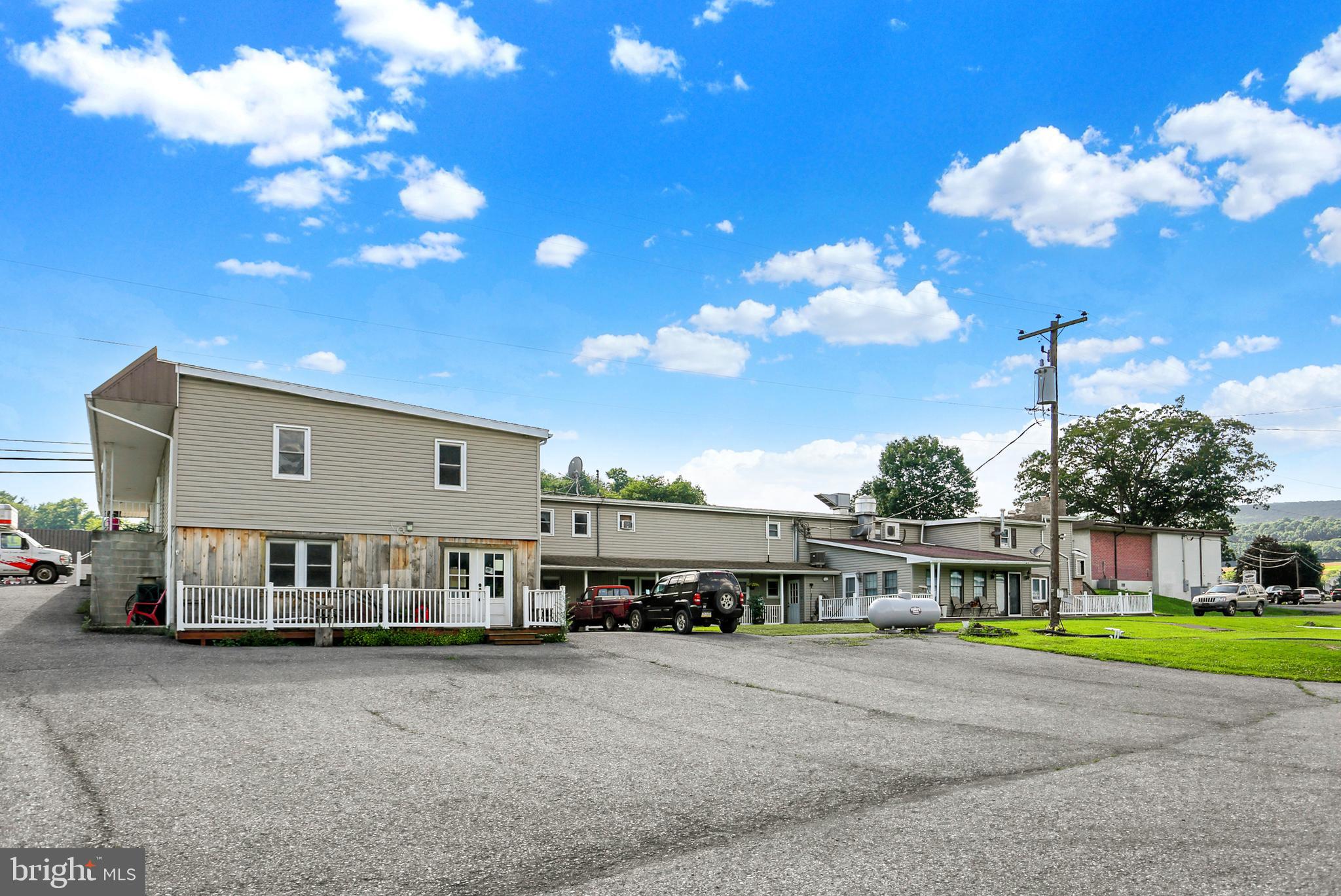 8370 Rte 104 Mount Pleasant Mills, PA 17853 - Photo 8 of 71 a view of a house with a yard