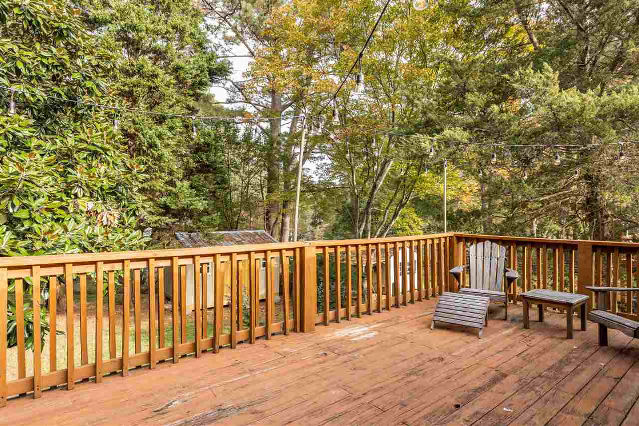 103 Crest Road Cary, NC 27513 - Photo 13 of 30 Spacious 21x13 deck, overlooking private back yard, with party lights! Gated for safety of children and dogs. Deck