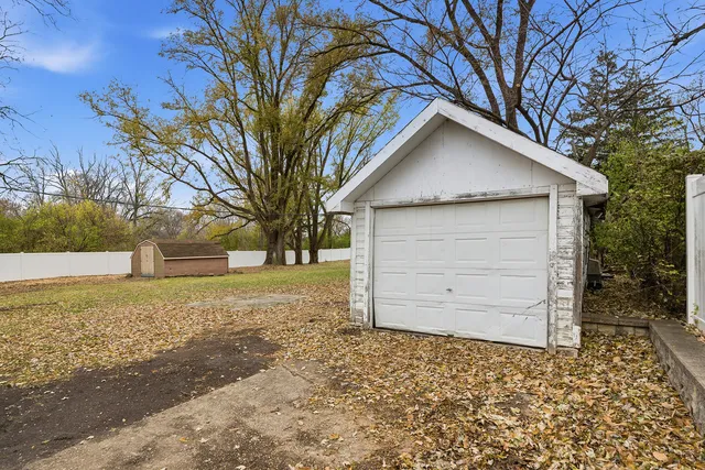 a house with trees in the background