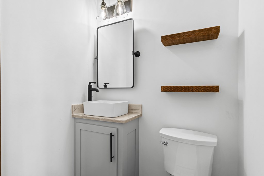 394 Mountain Trace Cherry Log, GA 30522 - Photo 27 of 70 a bathroom with a sink and a mirror