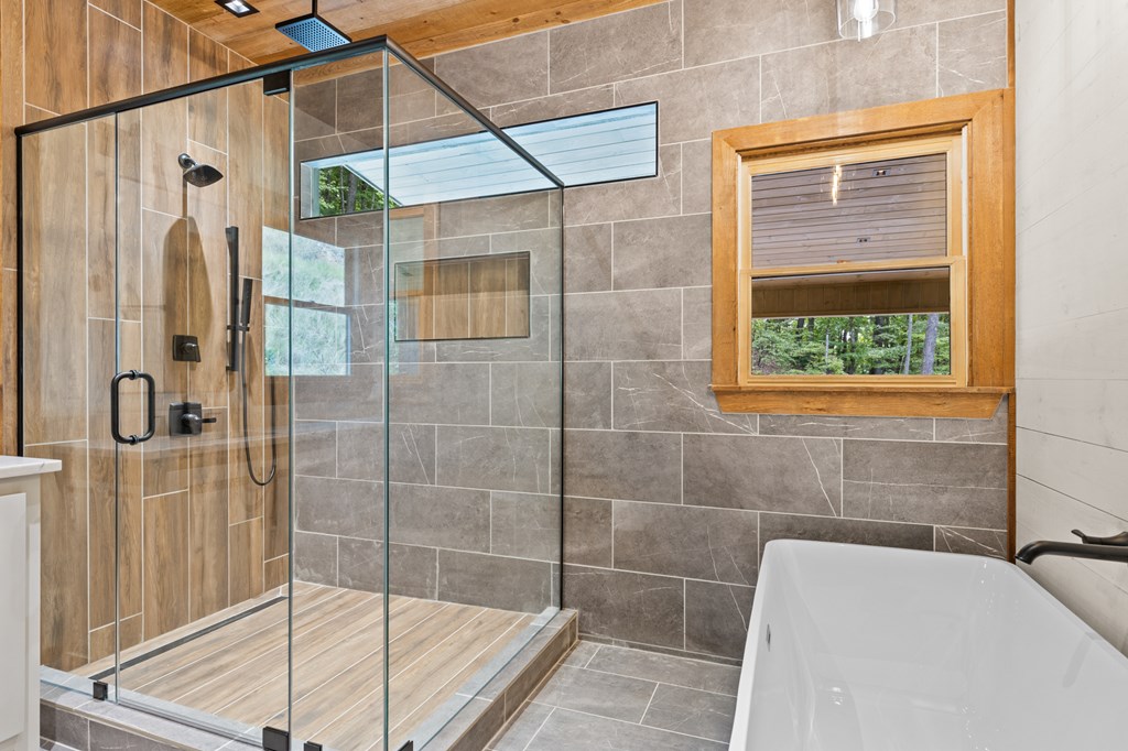 394 Mountain Trace Cherry Log, GA 30522 - Photo 34 of 70 a bathroom with a shower