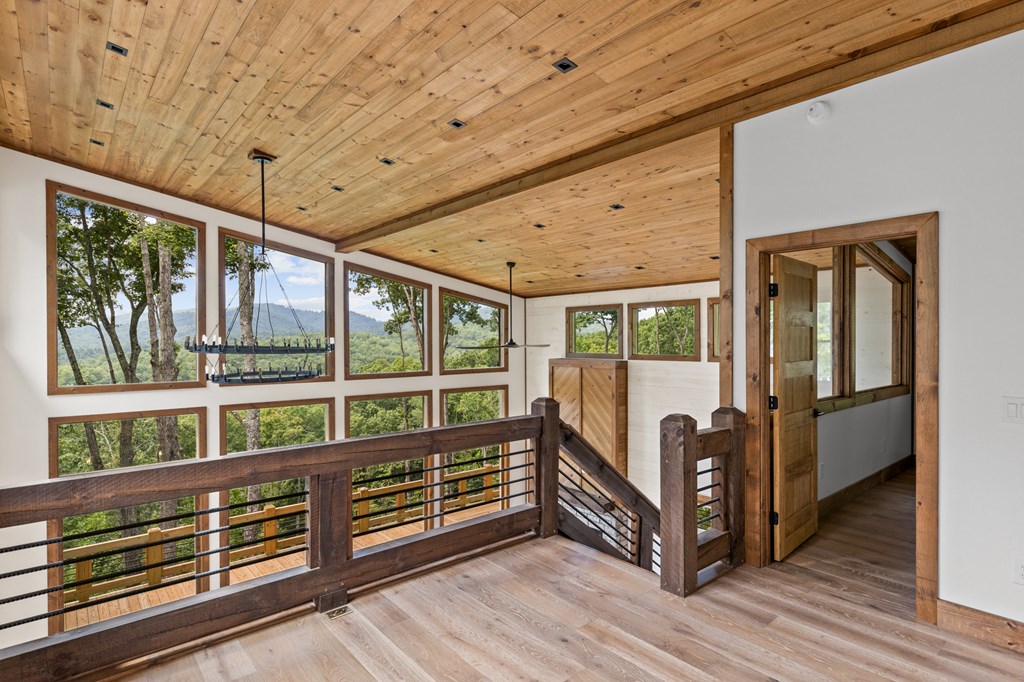 394 Mountain Trace Cherry Log, GA 30522 - Photo 36 of 70 a view of a porch with wooden floor